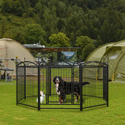 Dog in a playpen at a campsite with tents and greenery in the background
