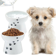 Pet food and water bowl with a small dog next to it on a white background