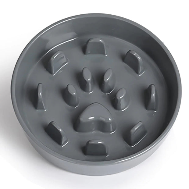 Gray pet bowl with paw print design on a white background