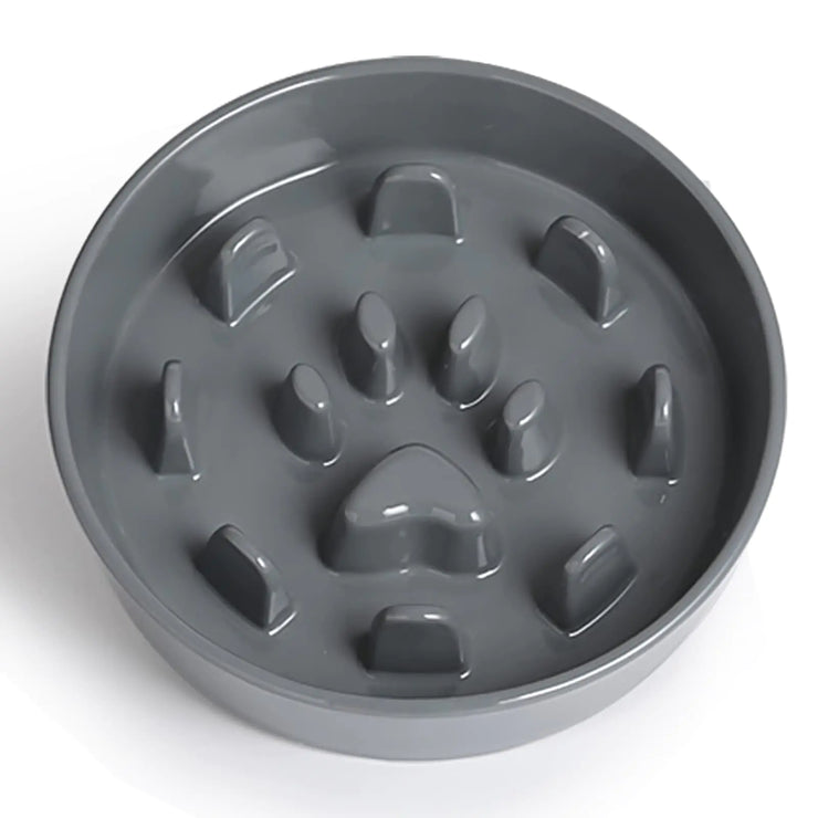 Gray pet bowl with paw print design on a white background