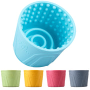 Blue textured cup with four additional colored cups on a white background