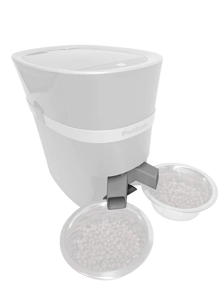 White pet water dispenser with two bowls on a white background